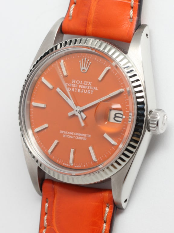 Rolex stainless steel Datejust wristwatch, Ref. 1601, serial number 1.6 million, circa 1967. 36mm full-size model with 14k white gold fluted bezel, custom-colored Valencia Orange pie pan dial with applied indexes and baton hands. Calibre 1570