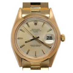Rolex Gold Oyster Perpetual Date Wristwatch circa 1969