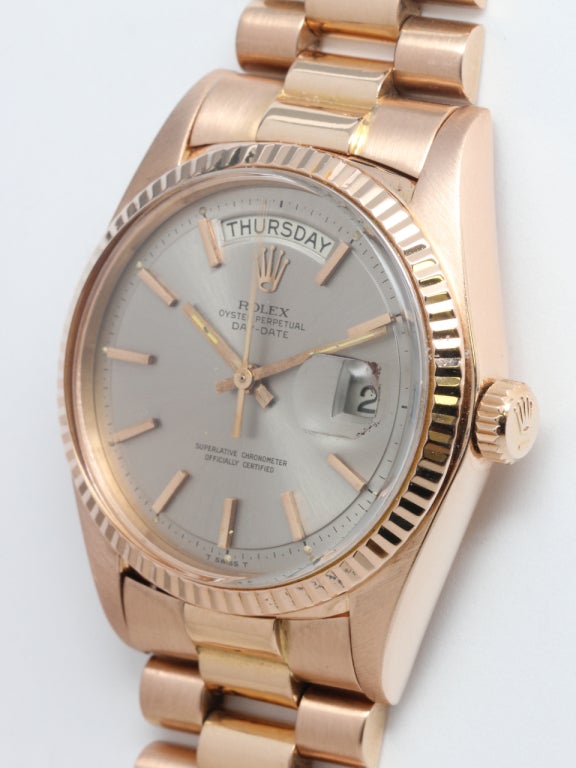 Rolex 18k pink gold Day-Date President wristwatch, Ref. 1803, serial number 3.5 million, circa 1973. 36mm case with fluted bezel and acrylic crystal and beautiful and rare original gray pie pan dial with applied pink indexes and pink baton hands.