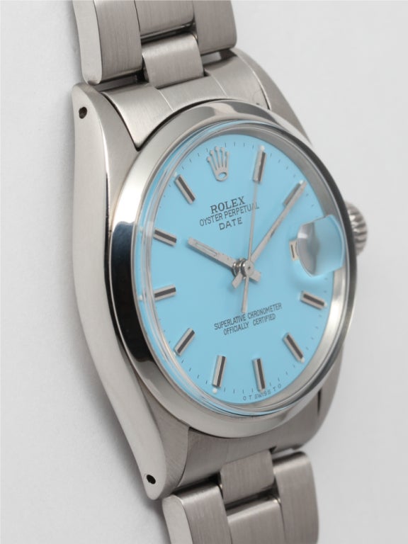 Rolex stainless steel Oyster Perpetual Date wristwatch, Ref. 15000, serial number 7.0 million, circa 1981. 34mm case with smooth bezel, acrylic crystal, and beautiful custom-colored Caribbean blue dial with applied indexes and baton hands. Powered