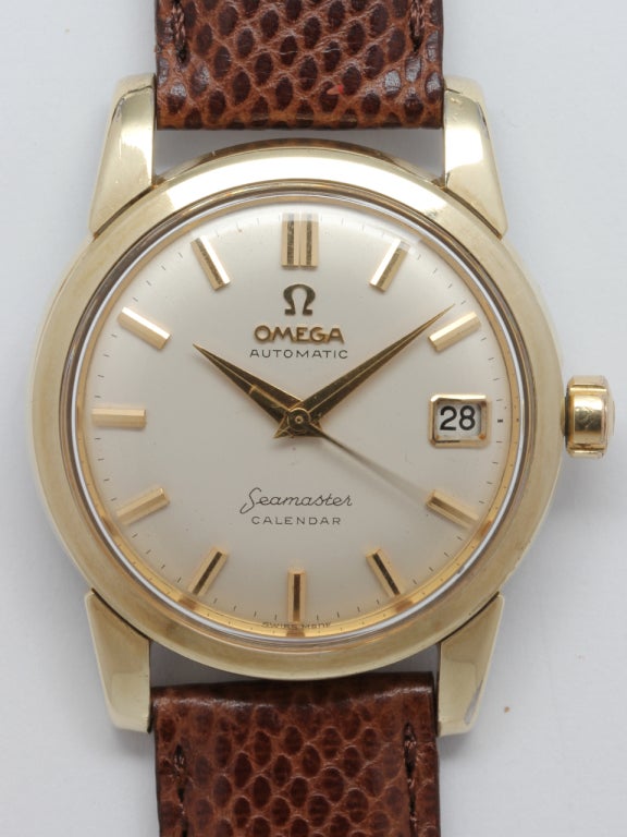 Omega Gilt top and Steel back automatic Seamaster Calendar wristwatch, Ref. 2849-12 SC. Beautiful condition 34 x 41mm case with wide bezel and lugs, caseback deeply embossed with Omega Seamonster logo, circa 1960. Beautiful condition original