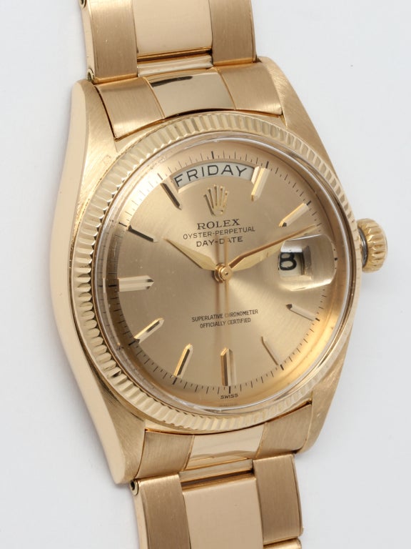 Rolex 18k yellow gold Day-Date President wristwatch, Ref. 1803, serial number 721,XXX, circa 1962. Great looking early 36mm diameter case with fluted bezel and gorgeous original champagne pie pan dial with applied indexes and tapered alpha style