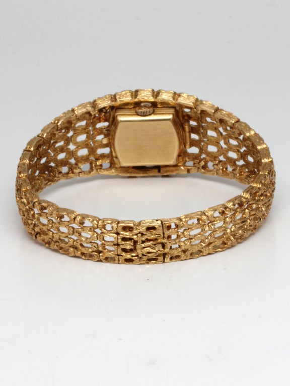 Omega Lady's Yellow Gold Concealed-Dial Bracelet Watch In Excellent Condition In West Hollywood, CA