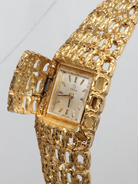 Omega Lady's Yellow Gold Concealed-Dial Bracelet Watch at 1stDibs