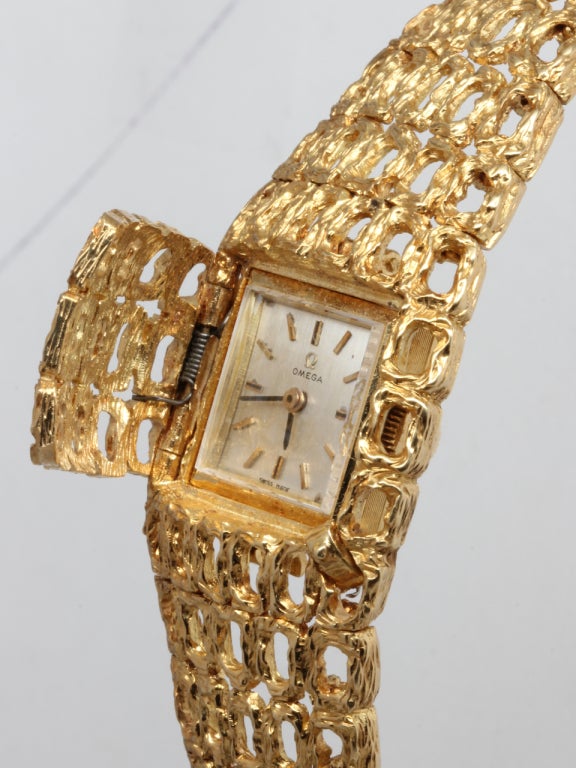 Omega Lady's Yellow Gold Concealed-Dial Bracelet Watch 1