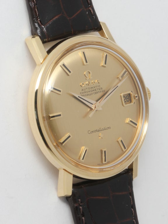 Omega 18k yellow gold Constellation wristwatch, Ref. 168.010/11, circa 1967. 34 X 40mm case with extended faceted lugs and partially recessed signed Omega crown. Beautiful condition original champagne dial with large applied gold indexes, applied