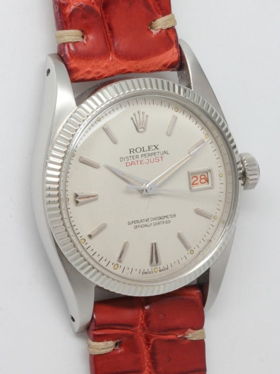 Rolex stainless steel early Datejust wristwatch, Ref. 6605, serial number 353,XXX, circa 1958. 36mm diameter case with 14k white gold milled bezel, antique white dial with applied early stylized indexes and tapered dauphine hands. Caliber 1065