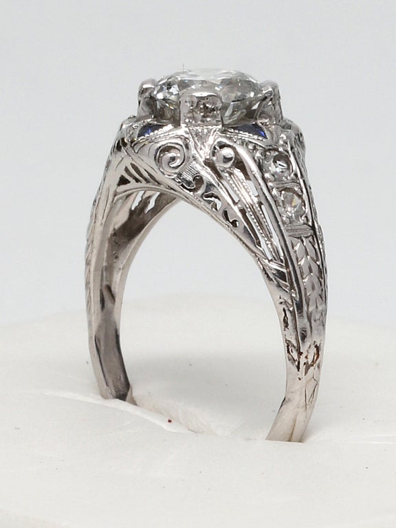 Old European Cut Art Deco Platinum Diamond and Sapphire Solitaire Ring, circa 1920s For Sale