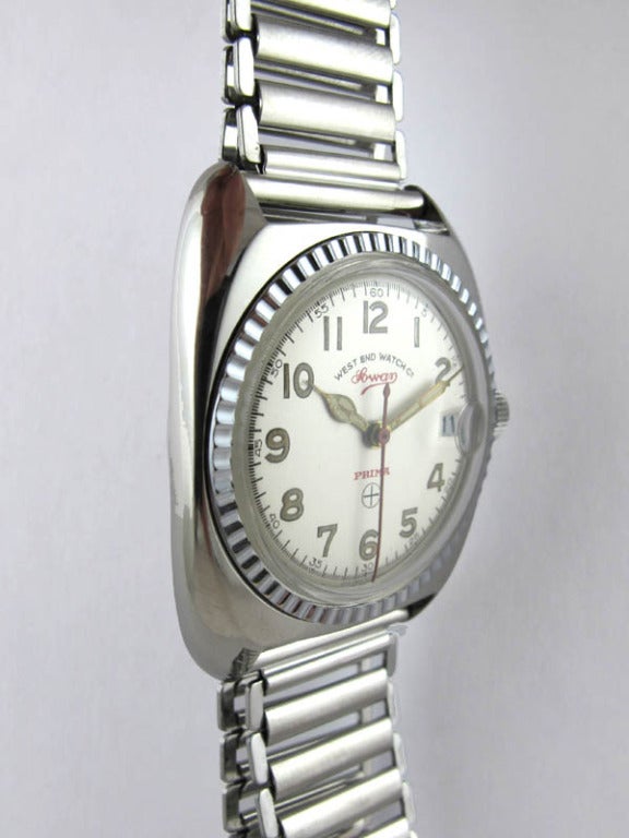 West End Watch Co stainless steel Prima wristwatch, circa 1950s. Ref. D3571-1549. Cushion-shaped case, 33 X 41mm. With adjustable ladder link bracelet. Cool looking model.

Serviced and detailed by one of our veteran watchmakers and offered with a