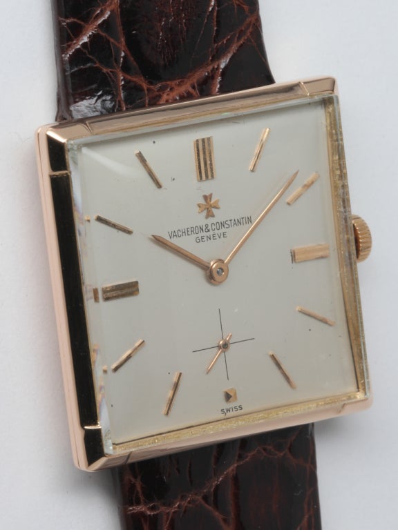 Vacheron & Constantin 18k rose gold square wristwatch, 28 x 28mm, Ref. 1001, circa 1950s. Featuring a beautiful original silvered satin dial with applied rose gold indexes and rose baton hands. 17-jewel manual-wind movement with subsidiary seconds.