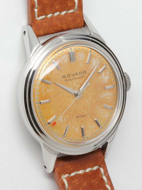 Movado stainless steel Tempomatic Sport wristwatch, Ref. 16191, circa 1950s. 33mm with stepped bezel, extended lugs, screw back and original crown, circa 1950s, original warmly patinaed dial with applied baton indexes and tapered alpha hands,