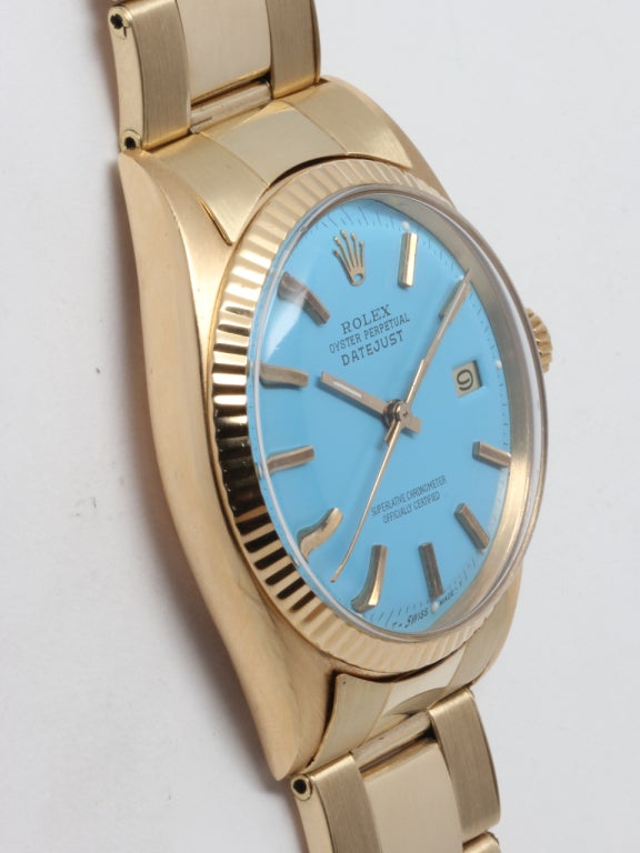 Rolex 18k yellow gold Datejust wristwatch, Ref. 1601, serial number 1.6 million, circa 1966. Full size 36mm case with acrylic crystal and custom colored blue dial. Self-winding calibre 1570 movement with sweep seconds and date. With associated 18k