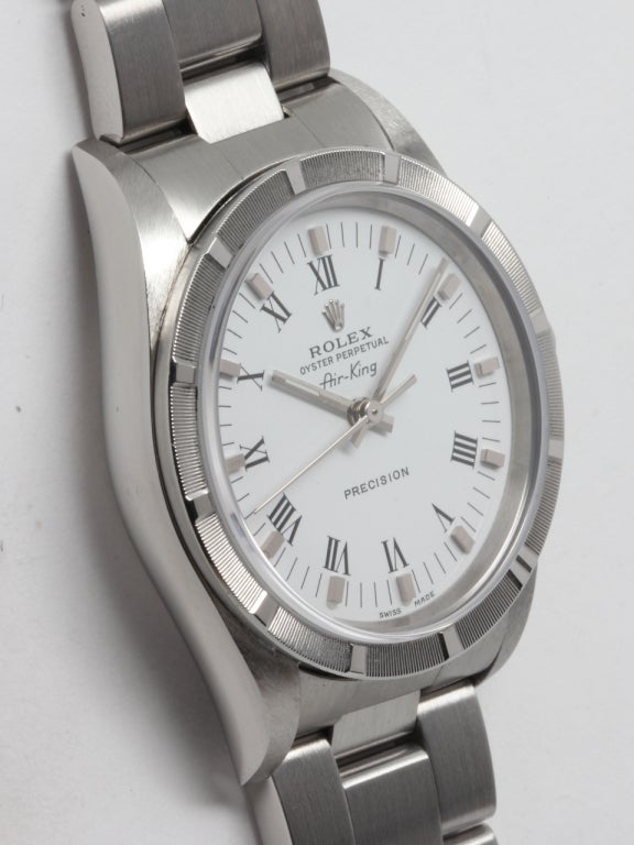 Rolex stainless steel Airking wristwatch, Ref. 14010, serial number D5, circa 2005. 34mm diameter case with engine-turned bezel and sapphire crystal. White dial with applied indexes and black printed Roman numerals, baton hands. Self-winding calibre