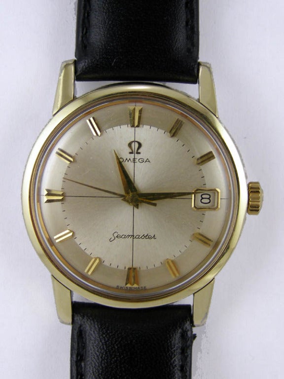 Omega gold shell Seamaster wristwatch, circa 1960s. 33.5 X 40mm screw back case with extended lugs. Very beautiful original two-tone silvered satin dial with applied indexes and dauphine hands. Self-winding caliber 610 movement with sweep seconds