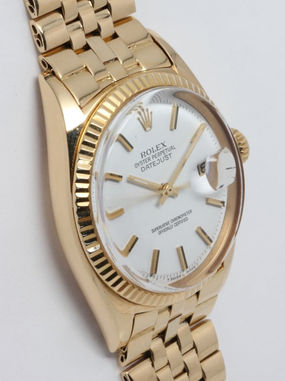 Rolex 18k yellow gold Datejust wristwatch, circa 1965. Great condition example, possibly South American market model with original white dial with gold applied indexes and gold baton hands, acrylic crystal, calibre 1570 movement with sweep seconds
