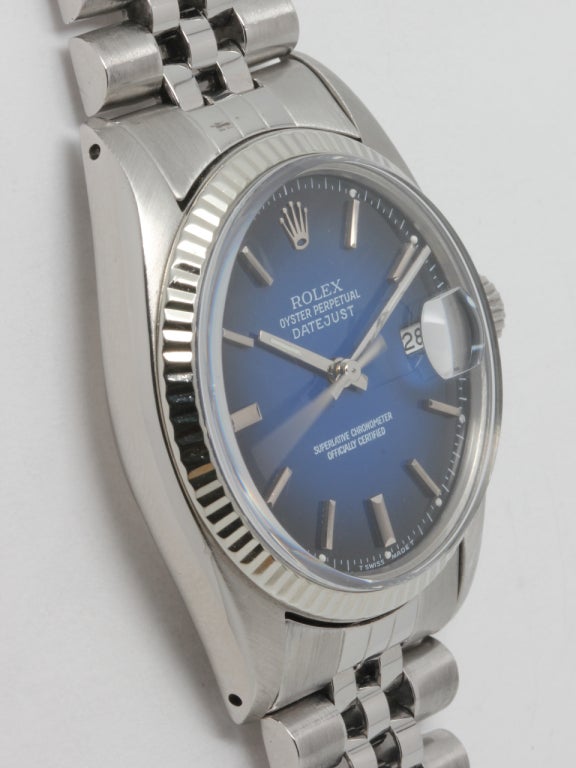 Rolex stainless steel Datejust wristwatch with 14k white gold bezel, serial number 6.1 million, circa 1979. 36mm diameter full size man's model with acrylic crystal and very pleasing two-tone blue gradient dial with lighter blue center and dark blue