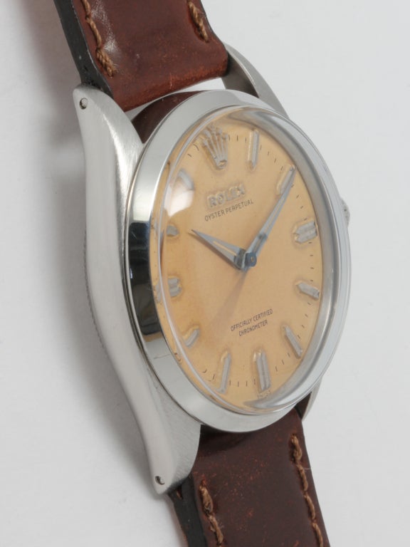 Rolex stainless steel Oyster Perpetual wristwatch, Ref. 6564, serial number 82,XXX, circa 1955. 34mm case with smooth bezel and acrylic crystal, with original warmly patinaed dial with applied indexes and dauphine hands. Powered by self-winding