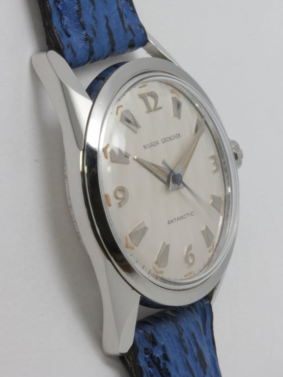 Nivada Grenchen stainless steel Antarctic automatic wristwatch, circa 1960s. 30 x 38mm screw back case with robust lugs, silvered dial with applied indexes and dauphine hands. 17-jewel automatic movement with sweep seconds and original knurled