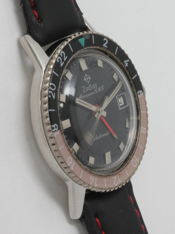 Zodiac stainless steel Aerospace GMT wristwatch, circa 1960s. 36 X 42mm screw back case with mint condition black and red bakelite bezel. Pristine condition glossy black dial with large applied indexes and broad luminous hands, red GMT hand.