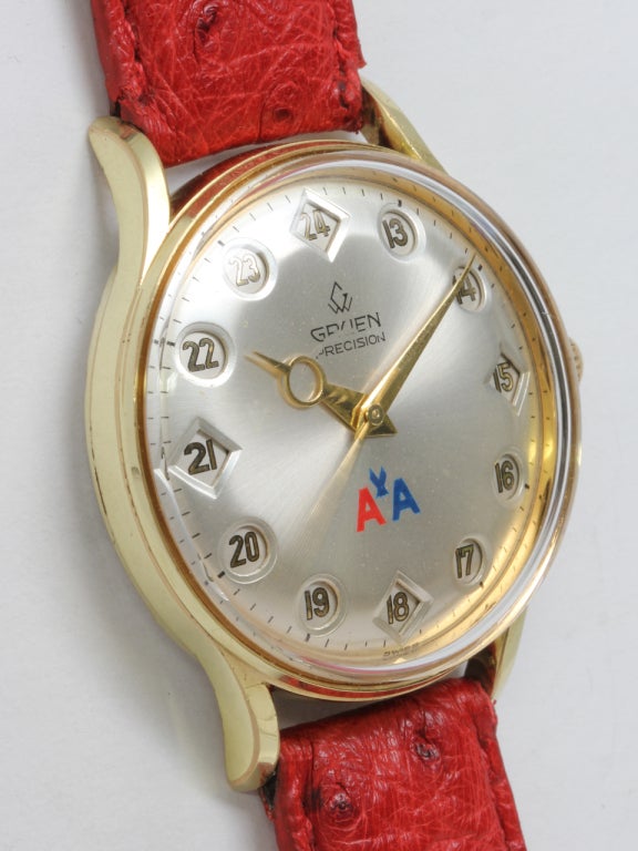 Gruen gilt metal and stainless steel Airman wristwatch with 24-hour jumping hours, made for American Airlines, circa 1960s. Very unusual and interesting model displaying normal hours 1-12 or military hours 13-24 through windows on the dial. Original