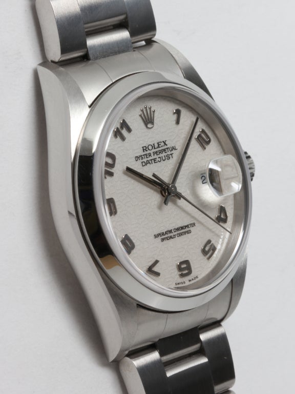 Rolex stainless steel Datejust wristwatch, Ref. 16200, circa 2004. 36mm case with smooth bezel and sapphire crystal. Factory white Jubilee dial with wrapping Arabic numerals. Calibre 3135 self-winding movement with quickset date. With Rolex