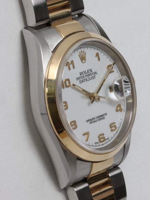 Rolex stainless steel and 18k yellow gold Oyster Perpetual Datejust wristwatch, Ref. 16203, circa 2003 with Rolex stainless steel 18k yellow gold heavy Oyster bracelet with deployant clasp. Very popular man's full size 36mm case with smooth bezel,
