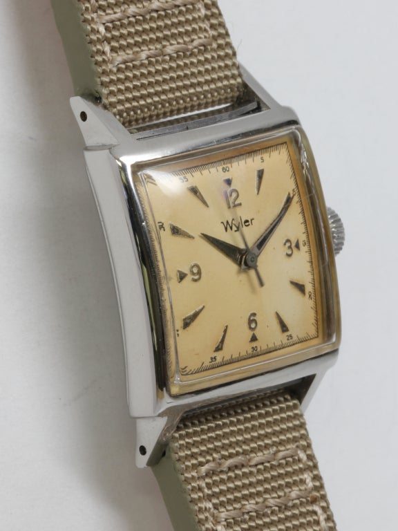 Wyler stainless steel square automatic wristwatch circa 1950s. 25 x 36mm case (including lugs), waterproof design with flange style crystal and very pleasing original satin dial with stainless steel applied Arabic numerals at 12, 3, 6 and 9. Offered