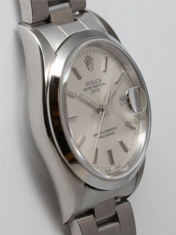 Rolex stainless steel Oyster Perpetual Date wristwatch, Ref. 15200, serial number W6, circa 1995. 34mm case with smooth bezel, sapphire crystal and original silvered satin dial with applied indexes and baton hands. Powered by calibre 3135