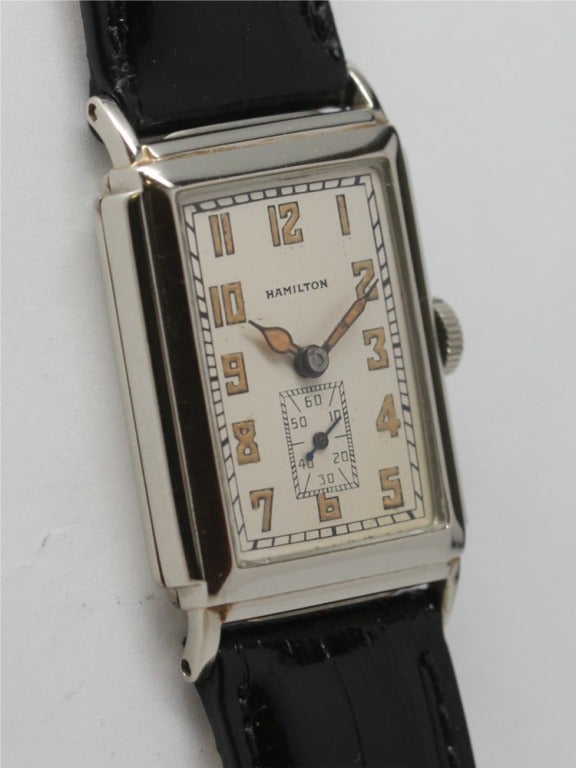 Hamilton 14k white gold Andrews rectangular wristwatch, circa 1932. 22 X 36mm stepped case, calibre 401, 19-jewel manual-wind movement with subsidiary seconds, silvered dial with luminous indexes and hands. A very pleasing example of this classic