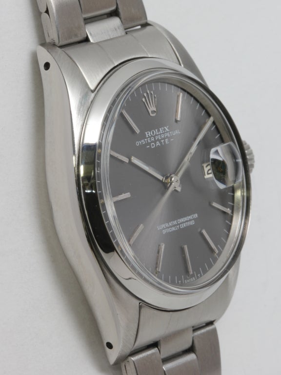 Rolex stainless steel Date wristwatch, Ref. 1501, serial number 5.2 million, circa 1977. 34mm case with smooth bezel and acrylic crystal. Scarce and popular original grey dial with applied indexes and baton hands. Self-winding caliber 1570 movement
