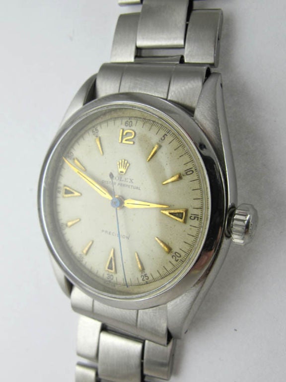 Rolex SS Big Bubbleback pre Explorer ref 6098 circa 1953. 36mm diameter<br />
heavy and thick Oyster case. Very pleasing original antique white dial with<br />
gold applied indexes and Rolex logo crown. Calibre A296 self winding<br />
chronometre