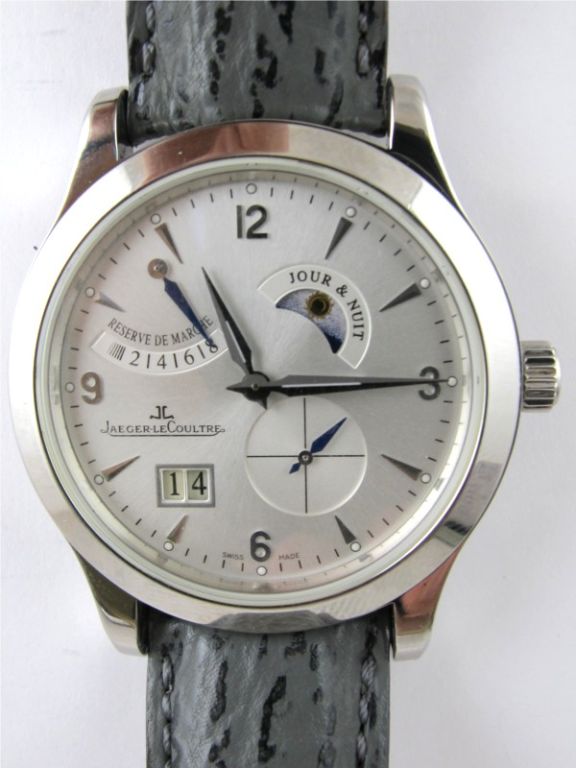 JLC Master 8-day ref# Q1608420 stunning silver dial with pointed applied markers. SS 41.5mm case on leather strap with signed deployment buckle, power reserve day-night indicator and big date and sub-second complications. Purchased new in 3/2008.