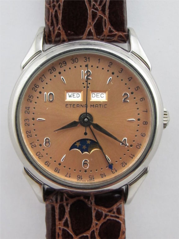 Platinum Eternamatic Ltd Edition triple calendar with moon phase ref #8406.76. With medium sized 33.5 x 40 mm screw back case with sapphire crystal display back. Limited edition #36 of 50 pieces circa 1990's. Featuring antique salmon dial with