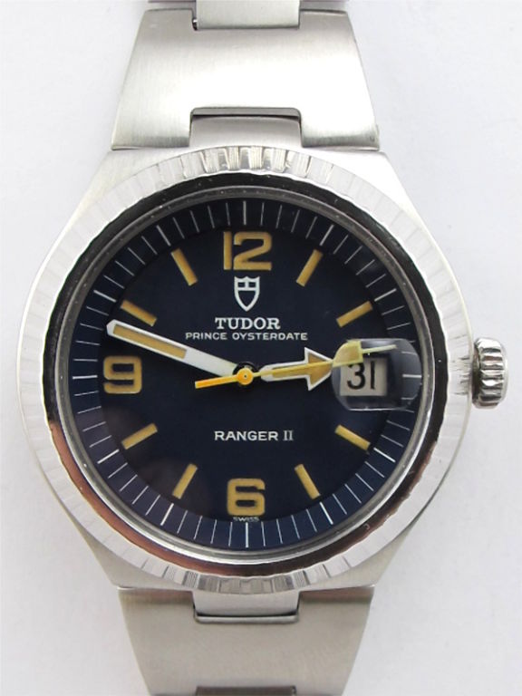 Tudor SS Ranger II ref 9111/01 serial # 838,xxx circa 1970's. Tonneau shaped case with fine engraved bezel, screw down crown, dark blue original dial with patina'd luminous indexes and matching hands. Dial signed Tudor Prince Oyster Date Ranger II