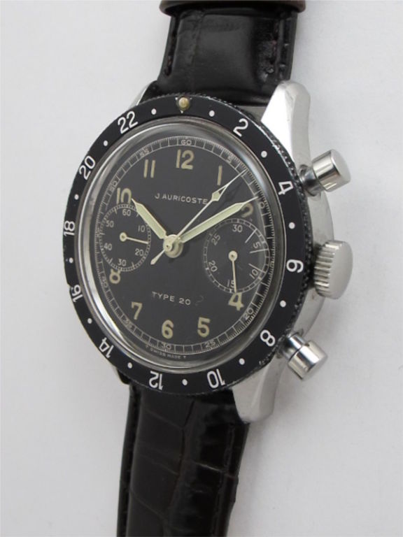 J Auricoste SS civilian version of French aviator's flyback chronograph circa 1960's. 38.5mm diameter case with black elapsed time bezel screw down case back, mint condition glossy black original dial with registers for 30 minutes and constant