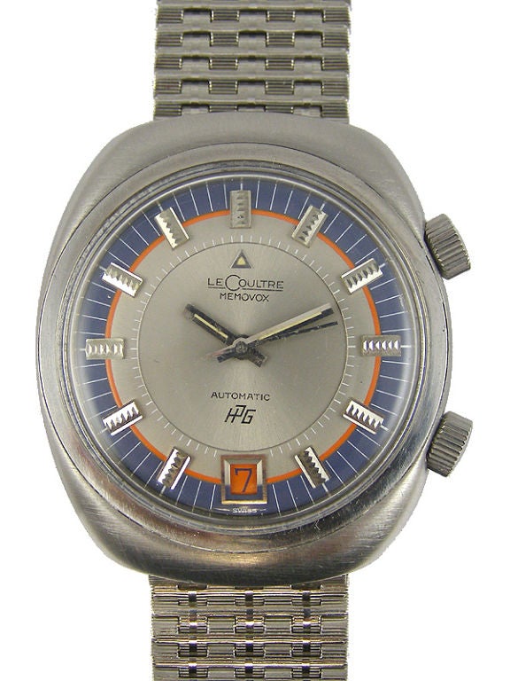 Jaeger Lecoultre SS Memovox alarm HPG 907 round stepped bezel design circa 1970's great original anthracite gray dial with applied silver indexes and orange alarm setting chapter.and matching date wheel. Calibre 916 self winding movement with date.