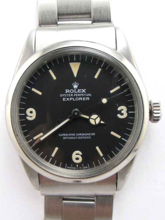 Rolex SS Explorer 1 ref 1016 serial# 2.1 million circa 1969. 36mm diameter case with smooth bezel, gret condition original matte black dial with ivory colored luminous indexes and matching mercedes hands. With Rolex SS riveted link Oyster bracelet.