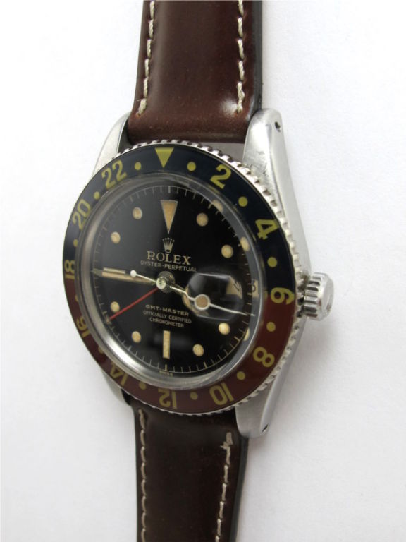 Rolex SS GMT ref 6542 early no crown guard model circa 1958 beautiful condition original glossy black dial with inner minute track and original luminous indexes and hands. After market bezel with bakelite insert. On your choice of fine leather