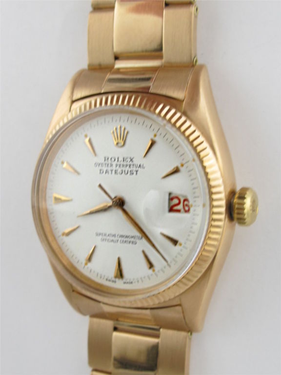 Rolex 18K PG Datejust ref #6305 serial# 36,xxx circa 1955. 36mm diameter fully size man's model with beautifully restored antique white dial with applied pink gold triangular shaped indexes and applied Rolex crown. Calibre 745 self winding movement
