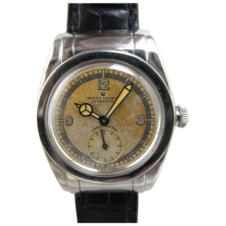 Rolex SS Hooded bubbleback circa 1940's. Fabulous rare original subseconds sector luminous dial, Antiqued luminous pencil style hands. Case back correctly signed case referene 3599. Very scarce vintage Rolex model with a fabulous and rare dial! A