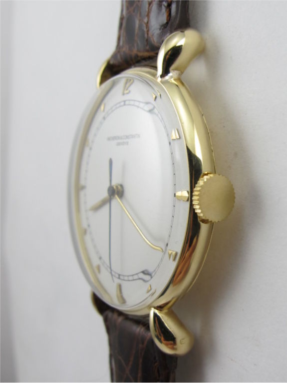 Vacheron & Constantin 18K YG large 35 X 43mm dress model with teardrop lugs circa 1950's with very pleasing restored white dial with gold applied indexes and elongated gold baton hands. 17 jewel high grade manual wind movement with sweep seconds.