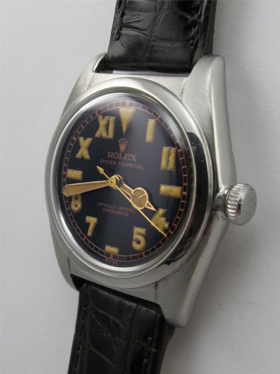 Rolex SS Bubbleback ref # 2940 31 x 38mm tonneau shaped case with smooth bezel circa 1946 with very pleasing original  black California dial with luminous indexes and luminous Mercedes style hands. Rolex N/A calibre self winding movement with sweep