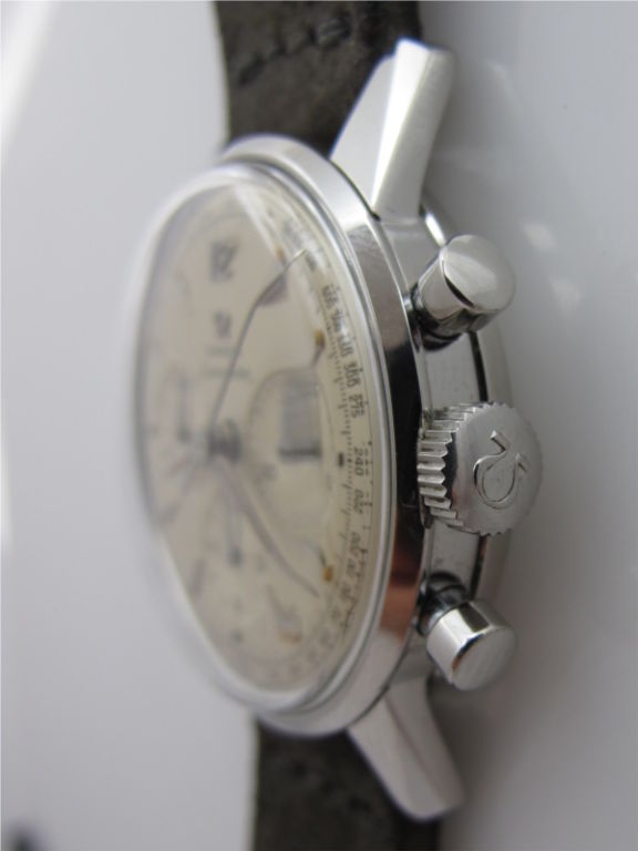 Omega SS Seamaster chronograph circa 1965 35 x 43mm water resistant style case with round pushers and snap back case circa 1965. Beautiful condition example with beautiful original silver satin dial with applied tear drop shaped indexes with light