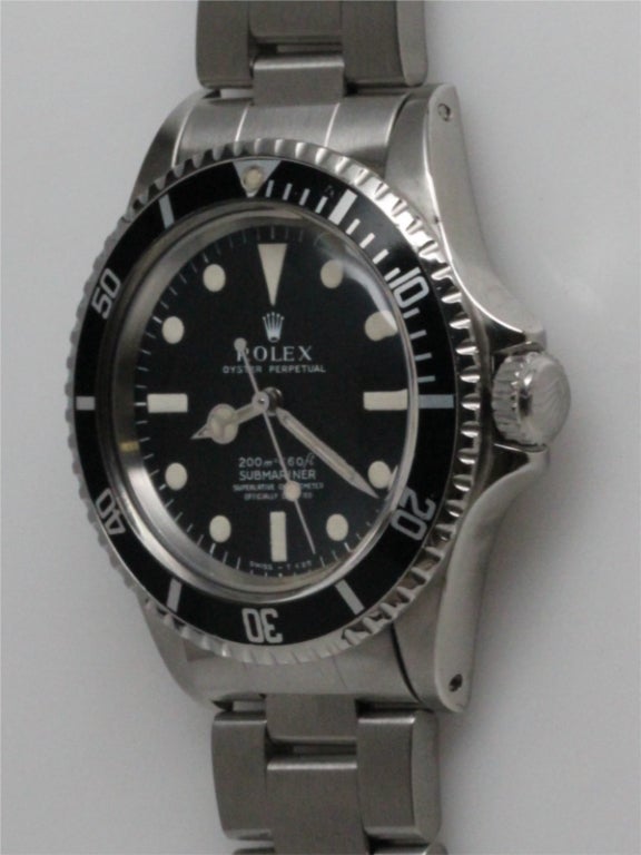 Rolex SS Submariner ref# 5512 1.8 million serial # circa 1967. Beautifully patina'd original matte black dial with original luminous indexes and matching luminous hands. Calibre 1570 chronometer rated movement with sweep seconds. With Rolex SS heavy