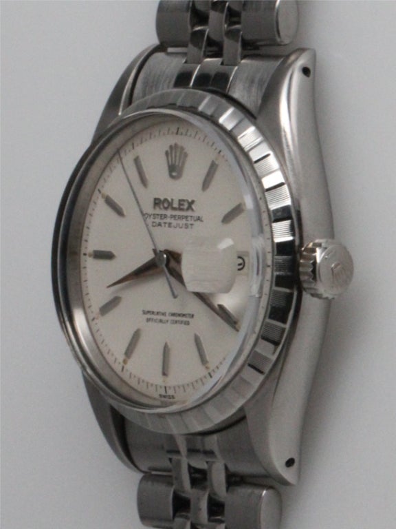 Rolex SS Datejust ref 6605 serial # 332,xxx circa 1957. 36mm diameter case with scarce early checkerboard style engraved bezel and beautiful original antique white pie pan dial with raised faceted and pointed silver indexes and tapered silver