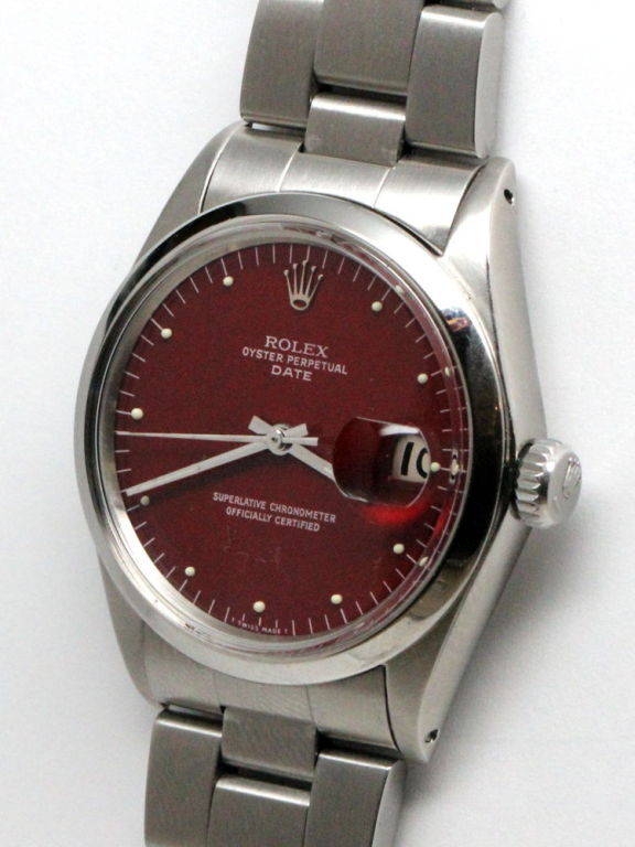 Rolex SS Oyster Perpetual Date serial # 2.4 million circa 1969. 34mm diameter case with smooth bezel and custom colored cherry red dial with luminous indexes and luminous baton hands. Self winding calbire 1520 self winding movement with sweep