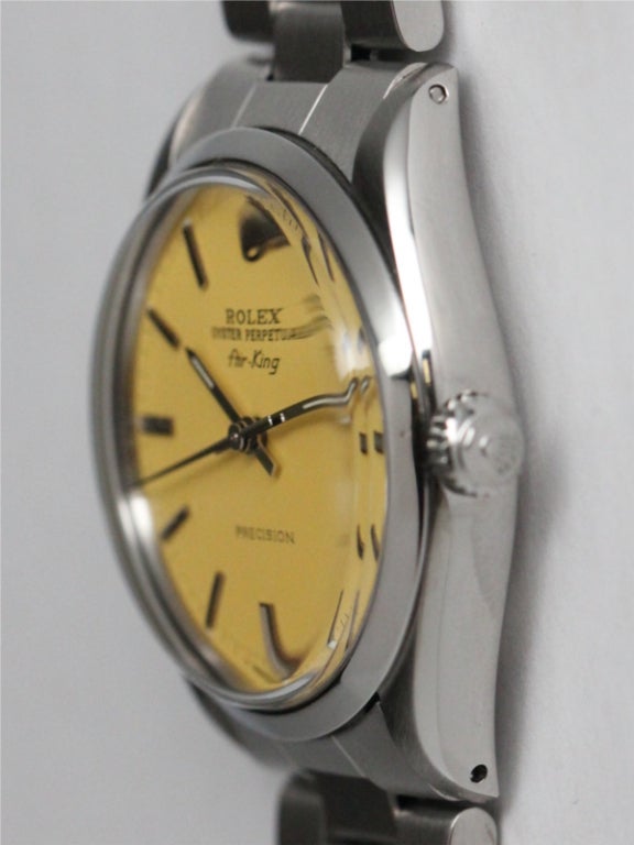 Rolex SS Oyster Perpetual Airking ref # 5500 serial #: # 4.4 million circa 1976. 34mm diameter case with smooth bezel and custom colored Buttered Popcorn dial with applied silver indexes and silver baton hands. Acrylic crystal, self winding calibre