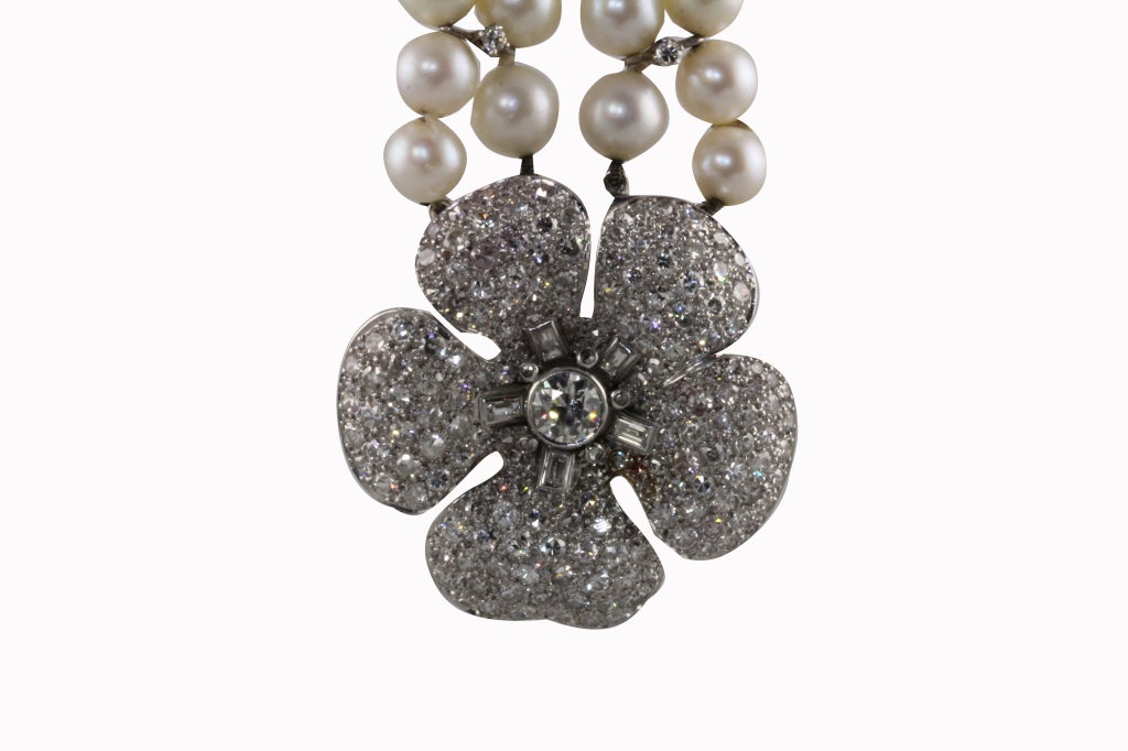 Multi Stranded Pearl Bracelet with Unique Diamond Flower