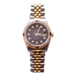 Rolex Stainless Steel and Yellow Gold Datejust Wristwatch with Ruby and Diamond Bezel
