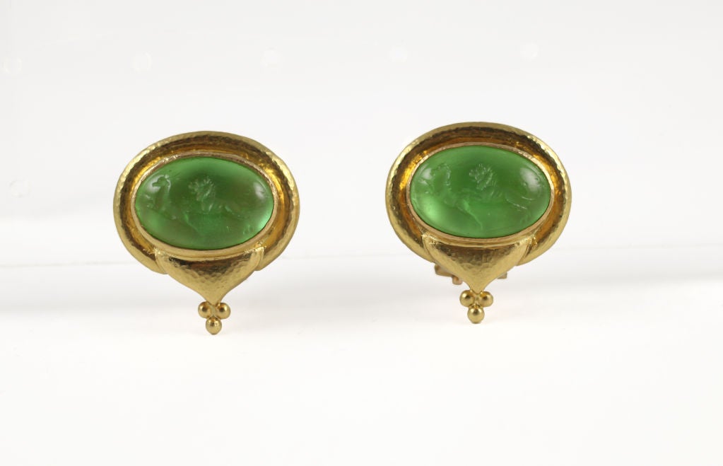 “Elizabeth Locke” 18k yellow gold venetian green glass intaglio earrings of “Lion and Antelope.” Each earring features a collapsable post with omega back.